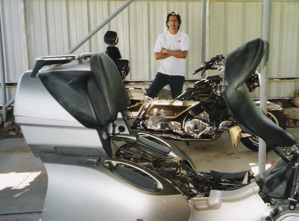 Michael with some street bikes he was repairing